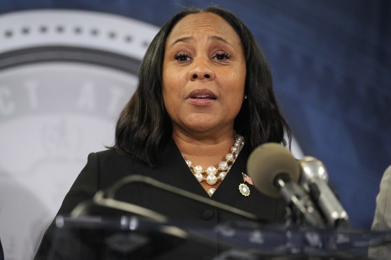 Fani Willis speaks in the Fulton County Government Center during a news conference