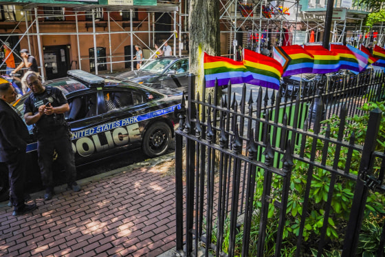 Pride flags decorate the fence at the Stonewall National Monument on June 13, 2023, in New York. 