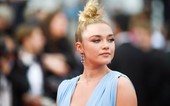 frances pugh pink dress Florence Pugh commands attention in a pink satin dress with a dramatic sheer cape at BIFA