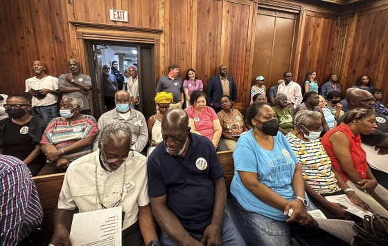 Image: Residents, landowners and supporters of the Hogg Hummock community on Sapelo Island fill a courtroom in Darien, Ga., on Sept. 12, 2023.