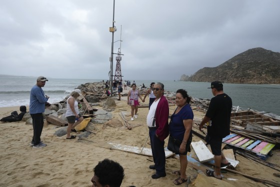 Tourists visit the lighthouse in Cabo San Lucas, Mexico on Saturday, after Hurricane Norma made landfall near the resorts of Los Cabos at the southern tip of Mexico’s Baja California Peninsula