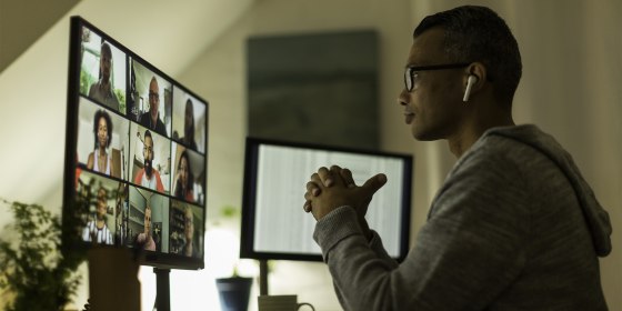 Businessman on video call from home office