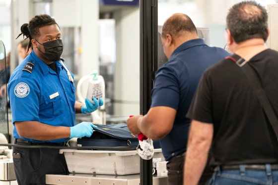 Travelers At HartsfieldJackson Atlanta International Airport As Congress Averts FAA Lapse With Stopgap Passage