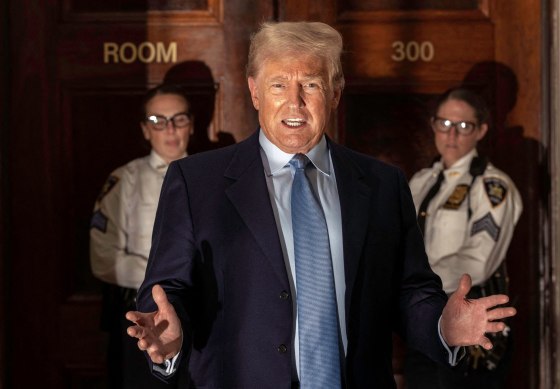 IMage: Former President Donald Trump speaks to the media after a hearing at New York State Supreme Court on Oct. 18.