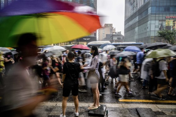 Participants take part in a Pride parade as part of the Seoul Queer Culture Festival in Seoul on July 16, 2022.