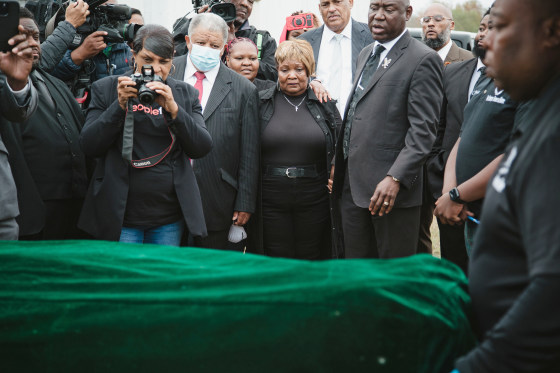 Dexter Wade's mother, Bettersten Wade, looks on as his body is exhumed from a field at the Hinds County jail's penal farm.
