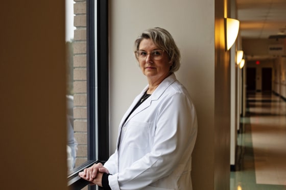 Dr. Powell in the hall of the labor and deliver wing at Monroe County Hospital in Monroeville, Ala.