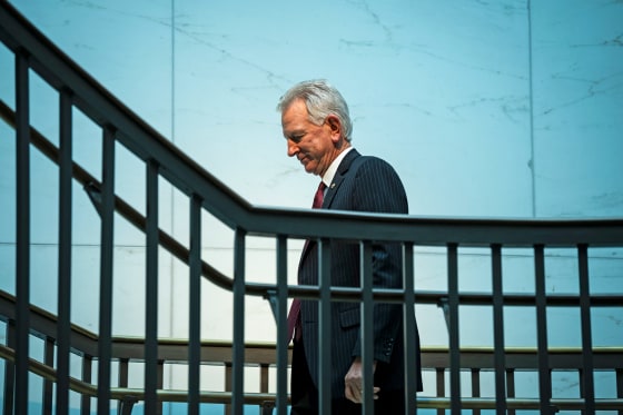 Sen. Tommy Tuberville, R-Ala., walks in the Capitol.