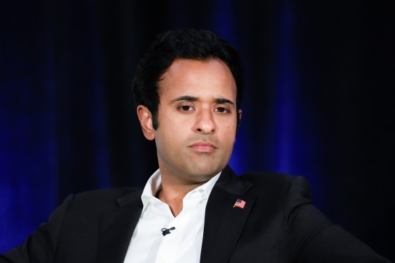  Vivek Ramaswamy listens to a question at an event