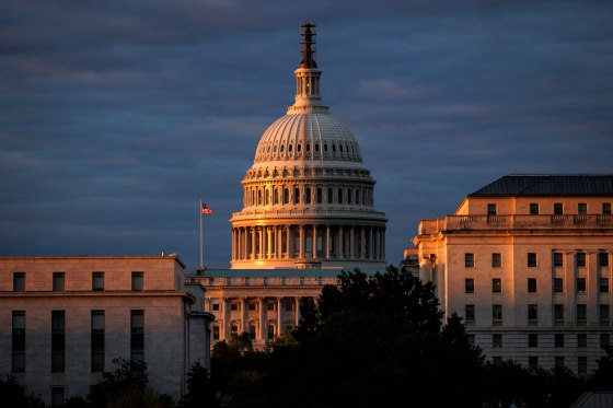 Lawmakers reach a deal to temporarily extend major federal 