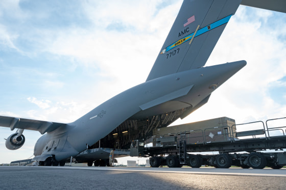 Weapons bound for Ukraine are loaded onto a C-17 Globemaster III at Dover Air Force Base, Delaware, on Aug. 19, 2022. 