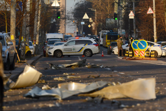 Police officers block a street after a Russian missile attack in Kyiv.