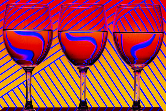 Close-up of wineglasses on table