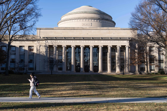 A student walks through the campus of the Massachusetts Institute of Technology in Cambridge, Mass., on Dec. 12, 2023.