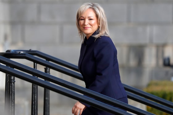 Michelle O'Neill smiles as she arrives at Stormont.