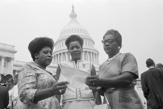 Members of the Mississippi Freedom Democratic Party and contestants for the state's five seats, Fannie Lou Hamer, Victoria Gray, and Annie Devine. They hold a telegram from then Speaker John McCormick granting them permission to take seats on the House of Representatives floor during the debate to affirm seating of its Mississippi members on Aug. 17, 1965.