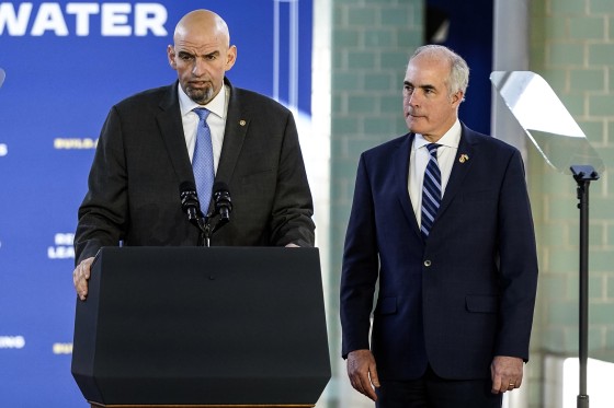Sen. John Fetterman, D-Pa., speaks as Sen. Bob Casey, D-Pa., 
