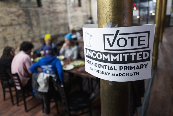 People gather at an Uncommitted Minnesota watch party during the presidential primary in Minneapolis