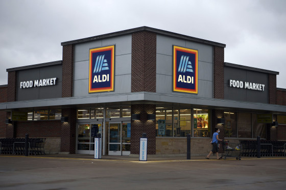 A shopper leaves an Aldi grocery store in Houston
