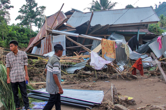 At least 19 dead and 7 missing as landslide and flash floods hit ...