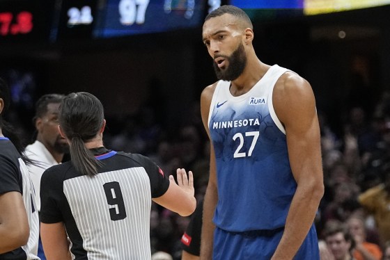 Rudy Gobert with referee Natalie Sago after being called for a technical foul in the second half of a game between the Minnesota Timberwolves and the Cleveland Cavaliers in Cleveland