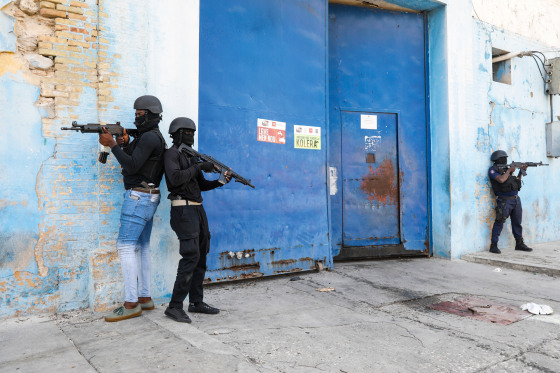 National Police stand guard outside the empty National Penitentiary
