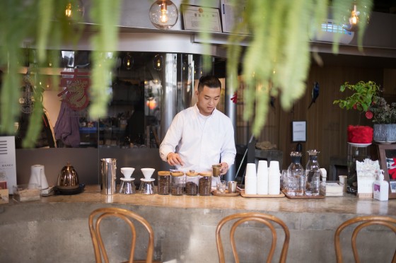 A barista prepares drinks at Metal Hands coffee shop in Beijing.