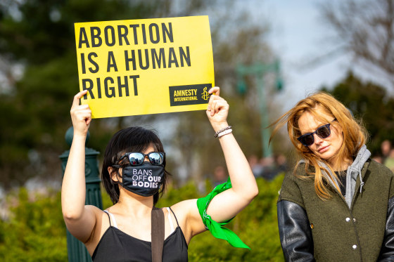 Demonstrators protest outside the U.S. Supreme