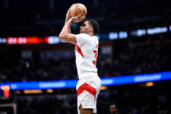 Jontay Porter attempts a 3-point shot 