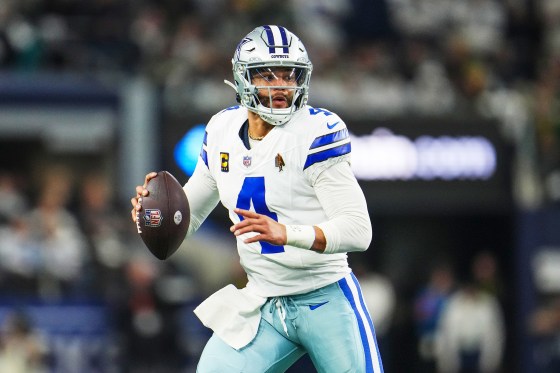 Dak Prescott Cowboys scrambles out of the pocket during a game