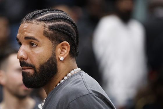 Drake leaves the court after the NBA game between the Toronto Raptors and the Los Angeles Lakers at Scotiabank Arena in Toronto