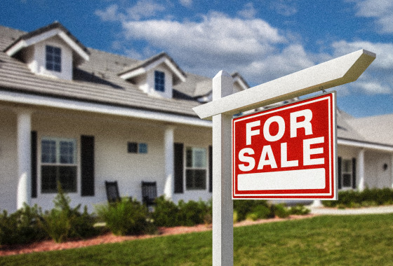 For Sale Sign in Front of New House.