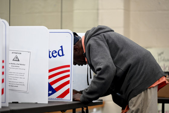 A voter casts their vote at Dunbar Recreation Center in Little Rock, Ark.