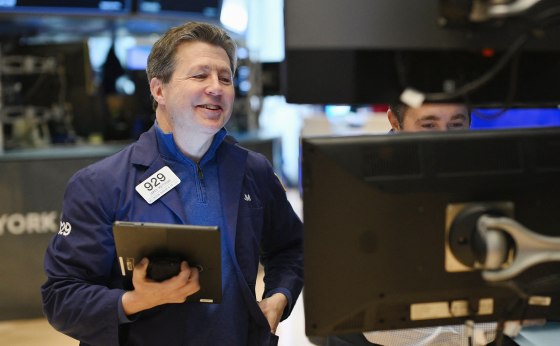 Traders work on the floor of the New York Stock Exchange