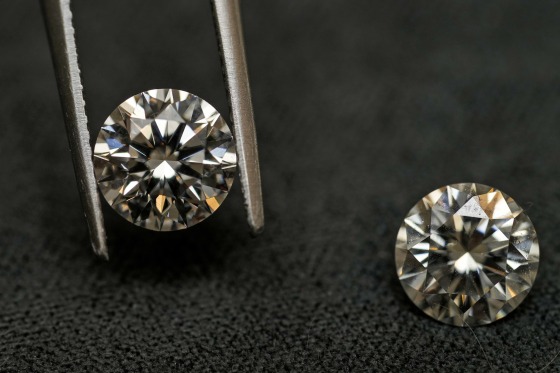 A lab-grown diamond, left, and a natural diamond