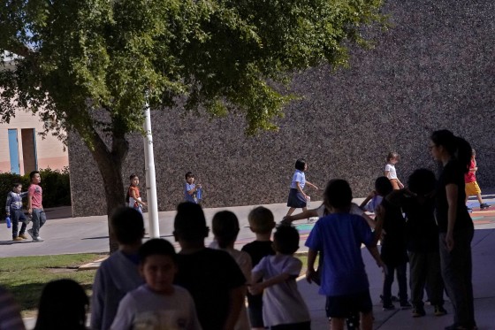 Whittier Elementary School students change classes on Oct. 18, 2022 in Mesa, Ariz. 
