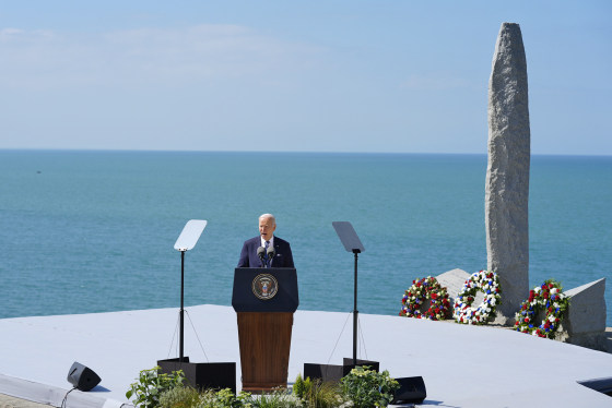 President Joe Biden stands next to the Pointe du Hoc monument in Normandy, France, on Friday, June 7, 2024.