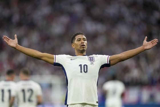 England's Jude Bellingham celebrates after scoring the opening goal during a Group C match between Serbia and England at the Euro 2024 soccer tournament in Gelsenkirchen, Germany, Sunday, June 16, 2024. 