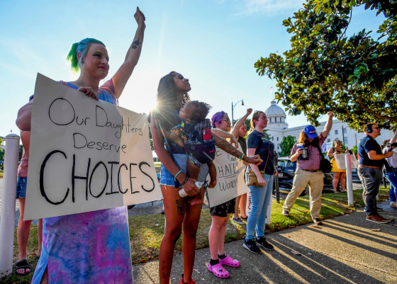 Protestors chant during an abortion rights rally on the grounds of the Alabama Statehouse