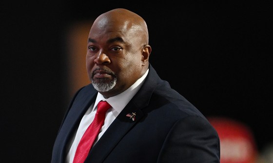 Mark Robinson speaks on stage on the first day of the Republican National Convention at the Fiserv Forum in Milwaukee