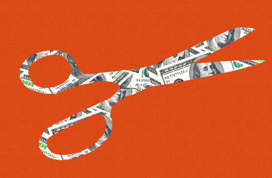 Photo Illustration: A cutout of scissors, against the backdrop of hundred dollar bills