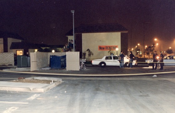 Police at the scene in Riverside, Calif., in 1987 where a newborn baby was found discarded and dead inside a dumpster.