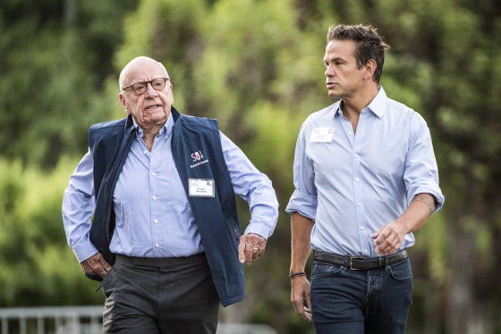 Rupert Murdoch and Lachlan Murdoch walk outside together