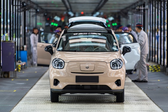 Cars rolling off the assembly line