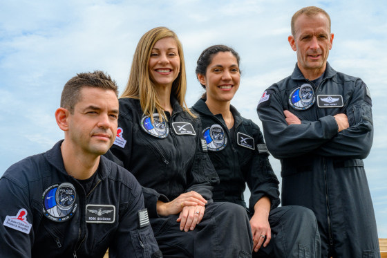 Polaris Dawn crew members Jared Isaacman, Anna Menon, Sarah Gillis, and Scott Poteet pose for a photo.