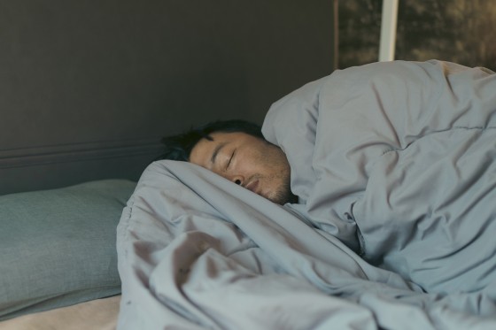 Asian young adult Deep sleep in the morning  in bedroom domestic life