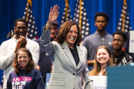 Kamala Harris walks and waves