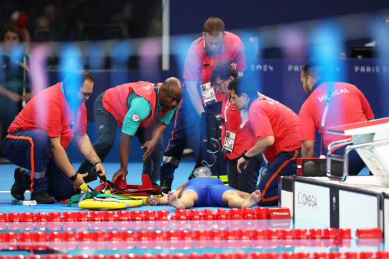 Slovakia's Tamara Potocka receives medical treatment following the Women's 200m Individual Medley Heats.