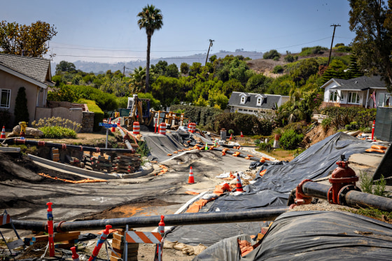 Severe landslide damage on a street