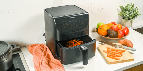 You can clean your air fryer with dish soap, water and a soft-bristle brush to get in between the grooves of the grate. 